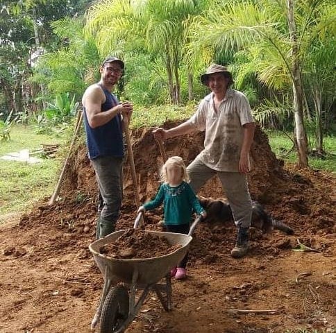 1.4 - The photo shows Jeff, Daisy and a local friend Hugo working through the soil pile generated from digging the septic tanks. All the building at Pousada Serra Verde has been on a small scale using locals and family.