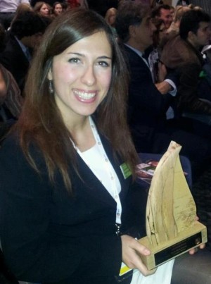 Lidija Mavra holding the Responsible Tourism Awards 2011 Prize